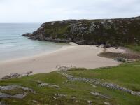 One of those empty sandy beaches you see all along the top road